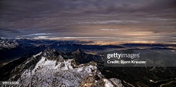 view from mt. saentis at full moon into the valley of the appenzeller land region towards lake constance, canton appenzell, switzerland - appenzeller land stock-fotos und bilder