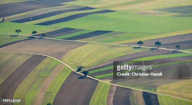 view of fields between maiersdorf and gaaden, hohe wand, lower austria, austria - space travel stock-fotos und bilder