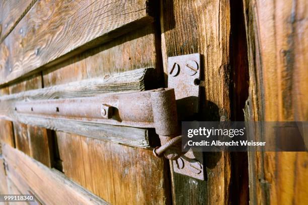 detail, barn with stables in grisons, switzerland - latch stock pictures, royalty-free photos & images