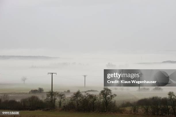 ground fog over franconian landscape, bavaria, germany - biological process foto e immagini stock
