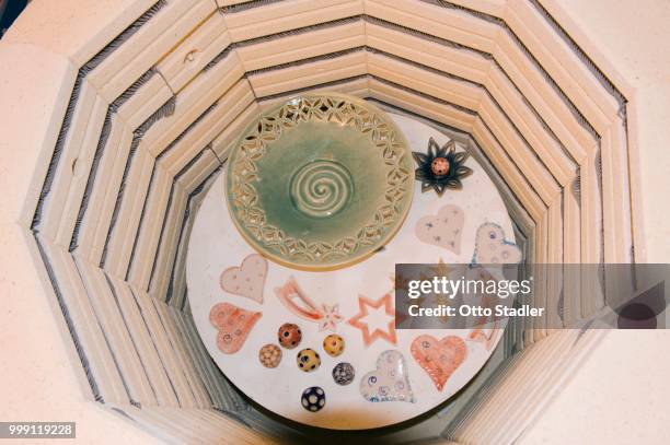 fired ceramic items in a kiln, geisenhausen, bavaria, germany - bricolaje stock pictures, royalty-free photos & images