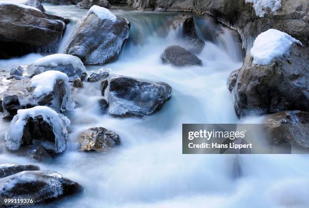 small waterfalls in the partnachklamm gorge at garmisch-partenkirchen, werdenfelser land region, upper bavaria, bavaria, germany - werdenfelser land fotografías e imágenes de stock