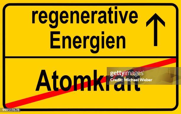 symbolic image in the form of a town sign, in german, exit from atomic power, entrance into regenerative energy sources - regenerative stock illustrations