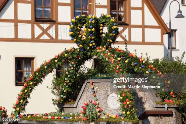 easter fountain, decorated fountain, kirchehrenbach, franconian switzerland, upper franconia, franconia, bavaria, germany - fachwerk stock pictures, royalty-free photos & images