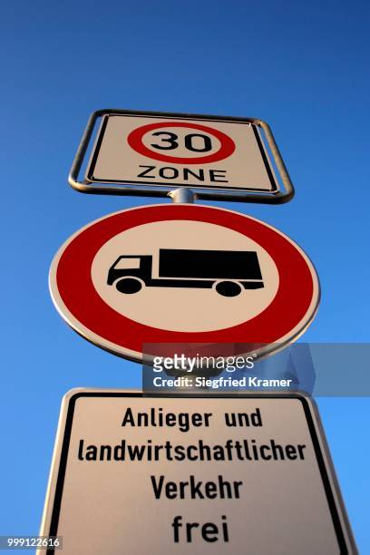 traffic signs, 30 zone, truck/lorry ban, residents and agricultural traffic excluded - indication stock pictures, royalty-free photos & images