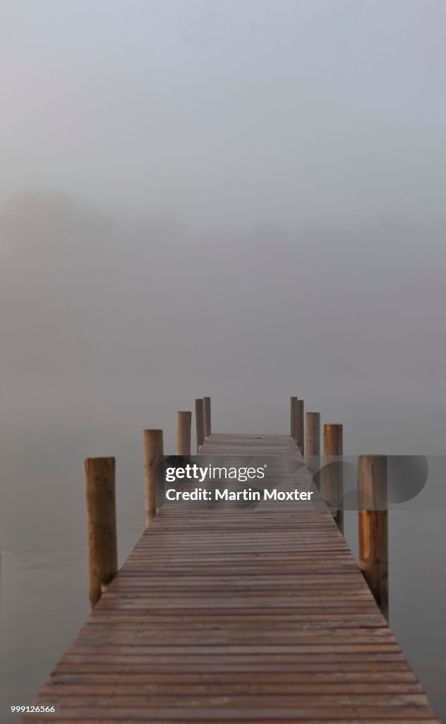 Wharf in the fog on Lake Staffelsee with the island of Woerth near Seehausen, Murnau, Upper Bavaria, Bavaria, Germany, PublicGround