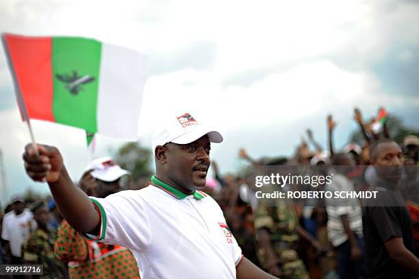 Burundi's Nkurunziza on God and grassroots development** Burundian President Pierre Nkurunziza smiles during an interview with AFP journalists in...