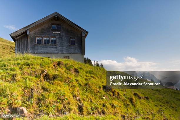 alpine cabin below mt faenerenspitz, 1505m, with views towards alpstein, appenzell innerrhoden or inner rhodes, switzerland, publicground - appenzell innerrhoden stock pictures, royalty-free photos & images