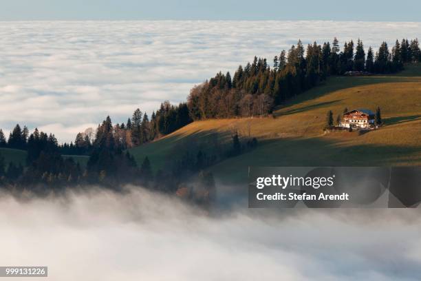 view from mt hirschberg with alpine hut and chapel near mt pfaender in autumn during high fog, austria, publicground - alpes do allgäu imagens e fotografias de stock