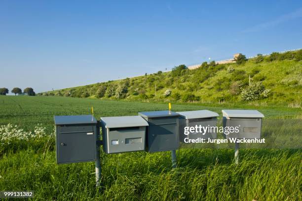 letter boxes in the middle of a field, strukkamphuk, fehmarn island, baltic sea, schleswig-holstein, germany - fehmarn stock pictures, royalty-free photos & images