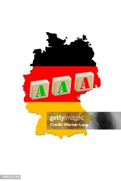 map of germany, three a's, one red a, risk of losing rating, triple a rating, symbolic image for rating agencies - werner stock illustrations