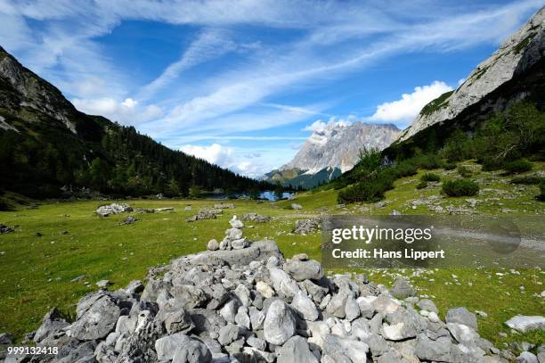 cairn in front of seebensee lake and mt zugspitze, ehrwald, tyrol, austria, publicground - werdenfelser land stock pictures, royalty-free photos & images