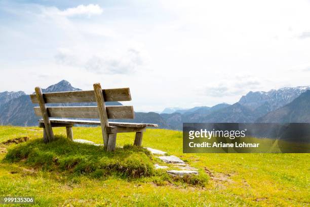 bench on a lookout in front of the alps, salzkammergut, austria, publicground - contre jour stock-fotos und bilder