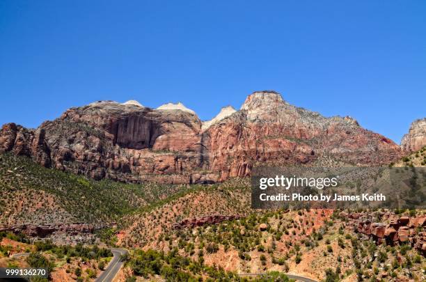 a classic american southwest road shot of highway 9 heading into zion national park. - southwest national park stock pictures, royalty-free photos & images