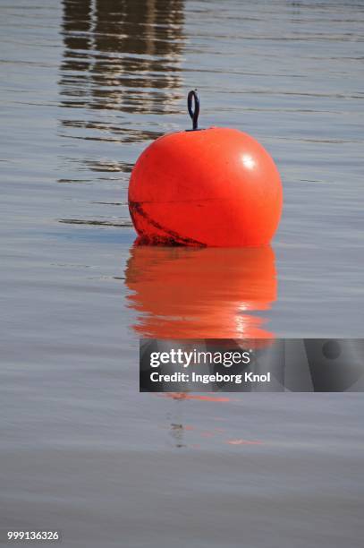 red buoy, brunsbuettel, kiel canal, schleswig-holstein, germany - brunsbuttel stock pictures, royalty-free photos & images