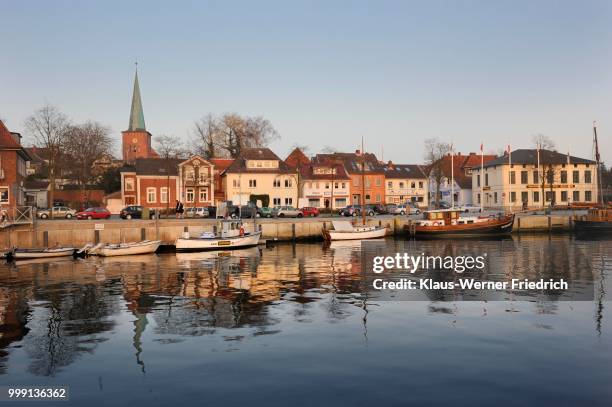 evening mood with the harbour and the town church of neustadt in holstein, schleswig-holstein, germany - werner stock pictures, royalty-free photos & images