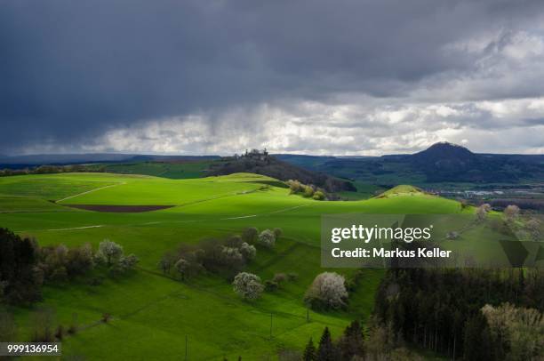 light mood in hegau with the hegau volcanoes of maegdeberg and hohenhewen, baden-wuerttemberg, germany - keller ストックフォトと画像