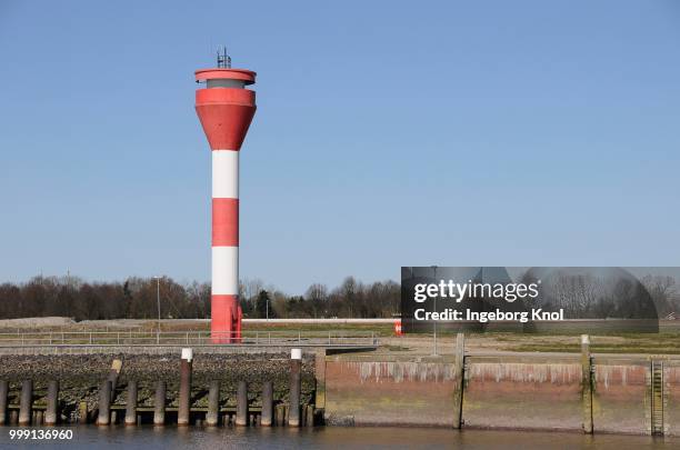 lighthouse in brunsbuettel, schleswig-holstein, germany - brunsbuttel stock pictures, royalty-free photos & images