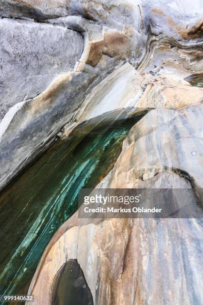 rock formation in the verzasca valley, canton of ticino, switzerland - tocino stock-fotos und bilder