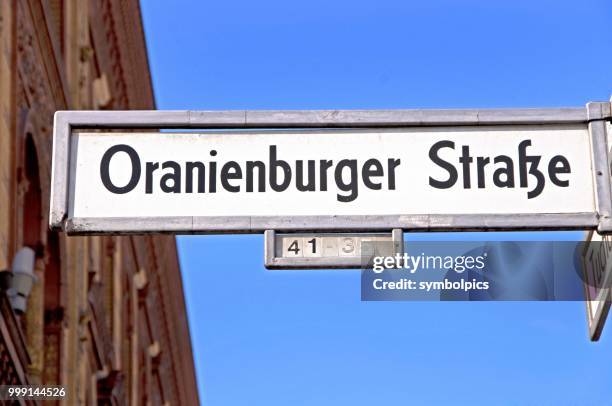 street sign --oranienburger strasse--, berlin, germany - strasse ストックフォトと画像