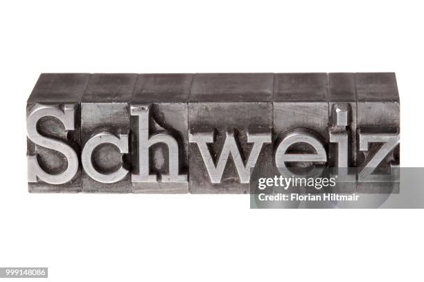 old lead letters forming the word --schweiz--, german for switzerland - schweiz 個照片及圖片檔