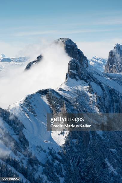 a cloud hanging next to staubernkanzel mountain, 1860m, kreuzberge mountains at the back, canton of appenzell innerrhoden, switzerland - appenzell innerrhoden stock pictures, royalty-free photos & images