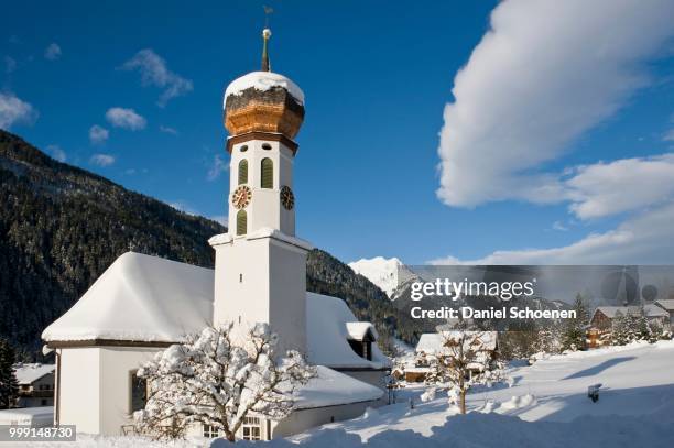 snow-covered church, st gallenkirch, montafon, vorarlberg, austria - onion dome stock pictures, royalty-free photos & images