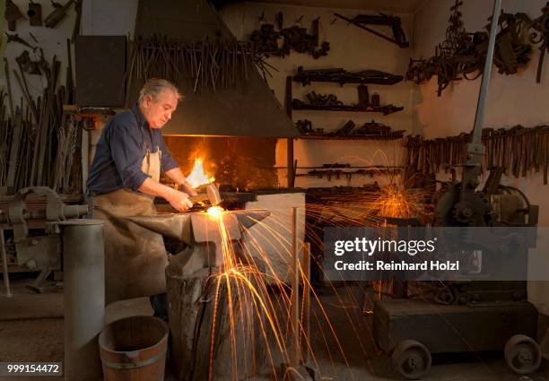 locksmith ernst stauder forging, schlosserei ernst stauder forge, schwaz district, tyrol, austria - ernst stock pictures, royalty-free photos & images