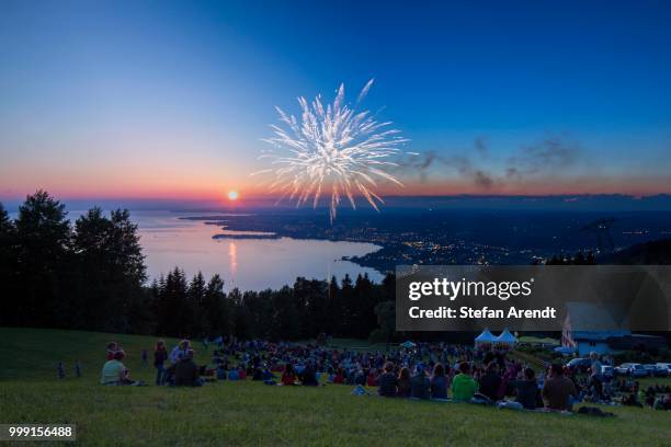 solstice celebrations with fireworks on mt pfaender, lake constance at back, near bregenz, vorarlberg, austria - bregenz stock pictures, royalty-free photos & images