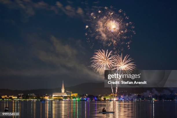 fireworks during the hausherrenfest festival, couple on a floating island in lake constance at the front, radolfzell, baden-wuerttemberg, germany - floating island stock pictures, royalty-free photos & images