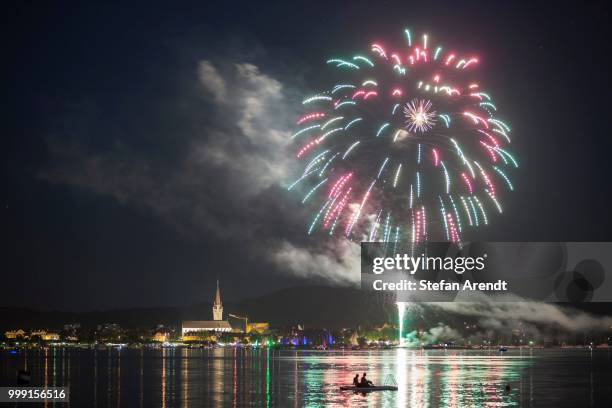 fireworks during the hausherrenfest festival, couple on a floating island in lake constance at the front, radolfzell, baden-wuerttemberg, germany - floating island stock pictures, royalty-free photos & images