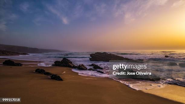 sunset and mist - oliveira stock pictures, royalty-free photos & images