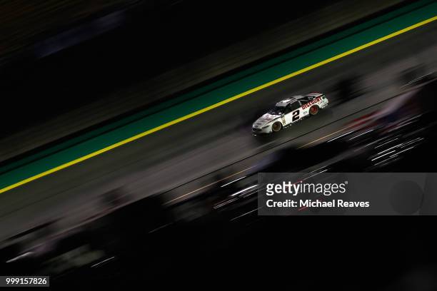 Brad Keselowski, driver of the Discount Tire Ford, races during the Monster Energy NASCAR Cup Series Quaker State 400 presented by Walmart at...