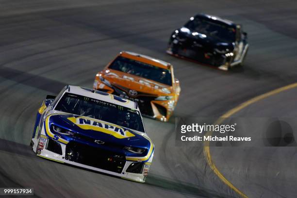 Chase Elliott, driver of the NAPA Auto Parts Chevrolet, leads a pack of cars during the Monster Energy NASCAR Cup Series Quaker State 400 presented...
