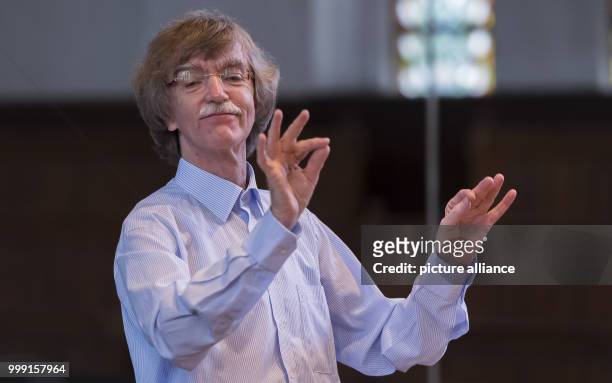 Thomas cantor Gotthold Schwarz rehearses together with the Thomanerchor before a motet in the St. Thomas Church in Leipzig, Germany, 12 August 2017....