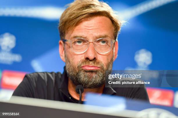 Liverpool's coach Juergen Klopp reacts during a press conference previously to the Champions League's qualifer match between 1899 Hoffenheim and FC...