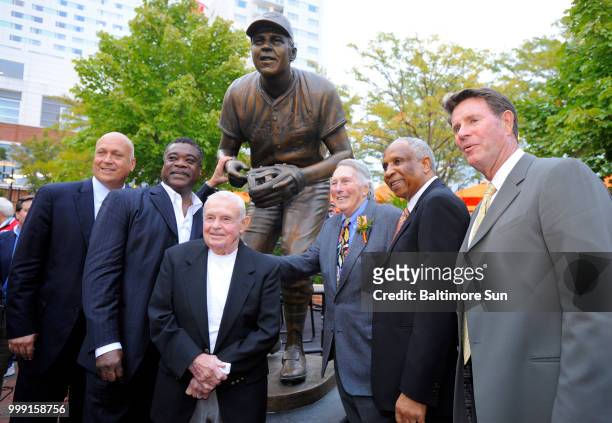 Baltimore Oriole Hall of Famers, from left, Cal Ripken Jr., Eddie Murray, Earl Weaver, Brooks Robinson, Frank Robinson and Jim Palmer pose for a...
