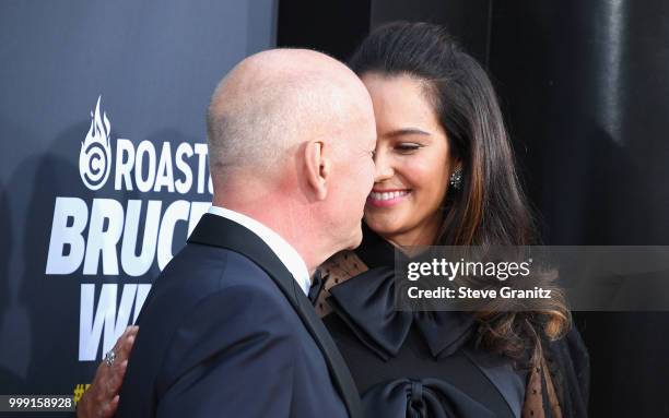 Bruce Willis and Emma Heming attend the Comedy Central Roast of Bruce Willis at Hollywood Palladium on July 14, 2018 in Los Angeles, California.