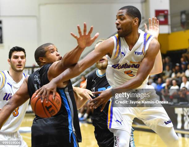 Khalif Wyatt of the Sons of Westwood makes a pass behind Jeff Gibbs of the D3 during the Western Regional game during The Basketball Tournament at...