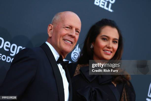 Bruce Willis and Emma Heming attend the Comedy Central Roast of Bruce Willis at Hollywood Palladium on July 14, 2018 in Los Angeles, California.