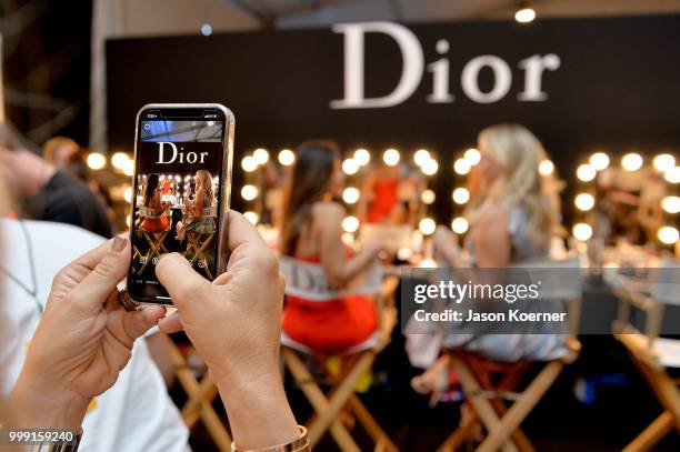 Dior on display backstage for Sinesia Karol during the Paraiso Fashion Fair at The Paraiso Tent on July 14, 2018 in Miami Beach, Florida.