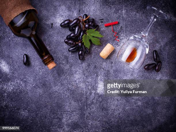 grapes, red wine, glass, corkscrews and cork - cork material bildbanksfoton och bilder