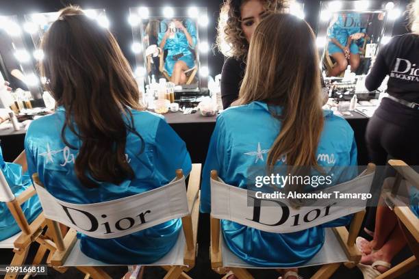 Models prepare backstage for Luli Fama during the Paraiso Fashion Fair at The Paraiso Tent on July 14, 2018 in Miami Beach, Florida.