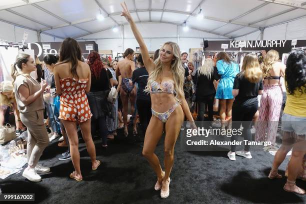 Agueda Lopez prepares backstage for Luli Fama during the Paraiso Fashion Fair at The Paraiso Tent on July 14, 2018 in Miami Beach, Florida.