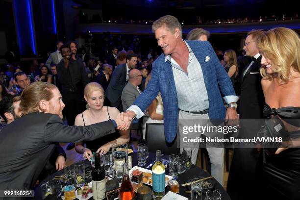 Seth Green and David Hasselhoff attend the Comedy Central Roast of Bruce Willis at Hollywood Palladium on July 14, 2018 in Los Angeles, California.