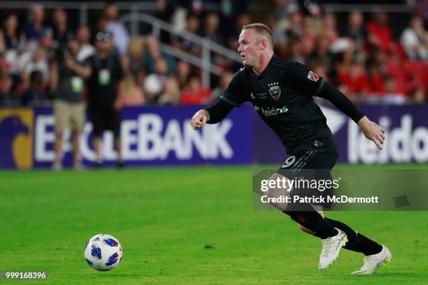 Wayne Rooney of DC United controls the ball in the second half against the Vancouver Whitecaps during his MLS debut at Audi Field on July 14, 2018 in...