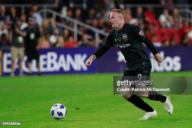 Wayne Rooney of DC United controls the ball in the second half against the Vancouver Whitecaps during his MLS debut at Audi Field on July 14, 2018 in...