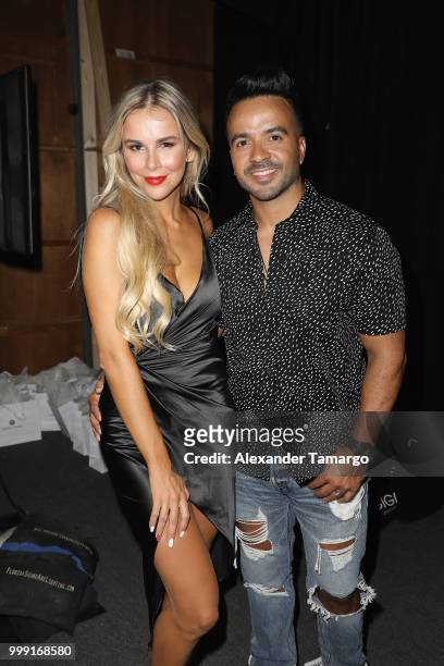 Agueda Lopez and Luis Fonsi backstage for Luli Fama during the Paraiso Fashion Fair at The Paraiso Tent on July 14, 2018 in Miami Beach, Florida.