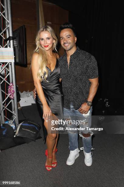Agueda Lopez and Luis Fonsi backstage for Luli Fama during the Paraiso Fashion Fair at The Paraiso Tent on July 14, 2018 in Miami Beach, Florida.