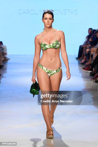 Model walks the runway for Caroline Constas at Miami Swim Week powered by Art Hearts Fashion Swim/Resort 2018/19 at Faena Forum on July 14, 2018 in...